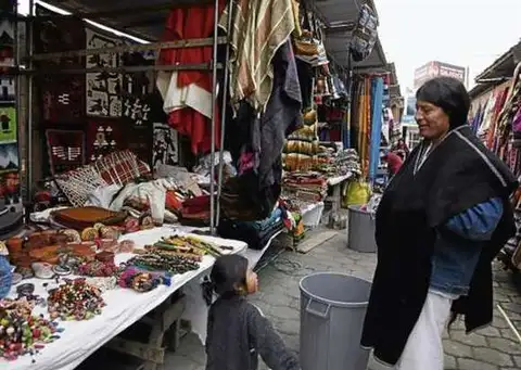 SQ fav man selling tapestries